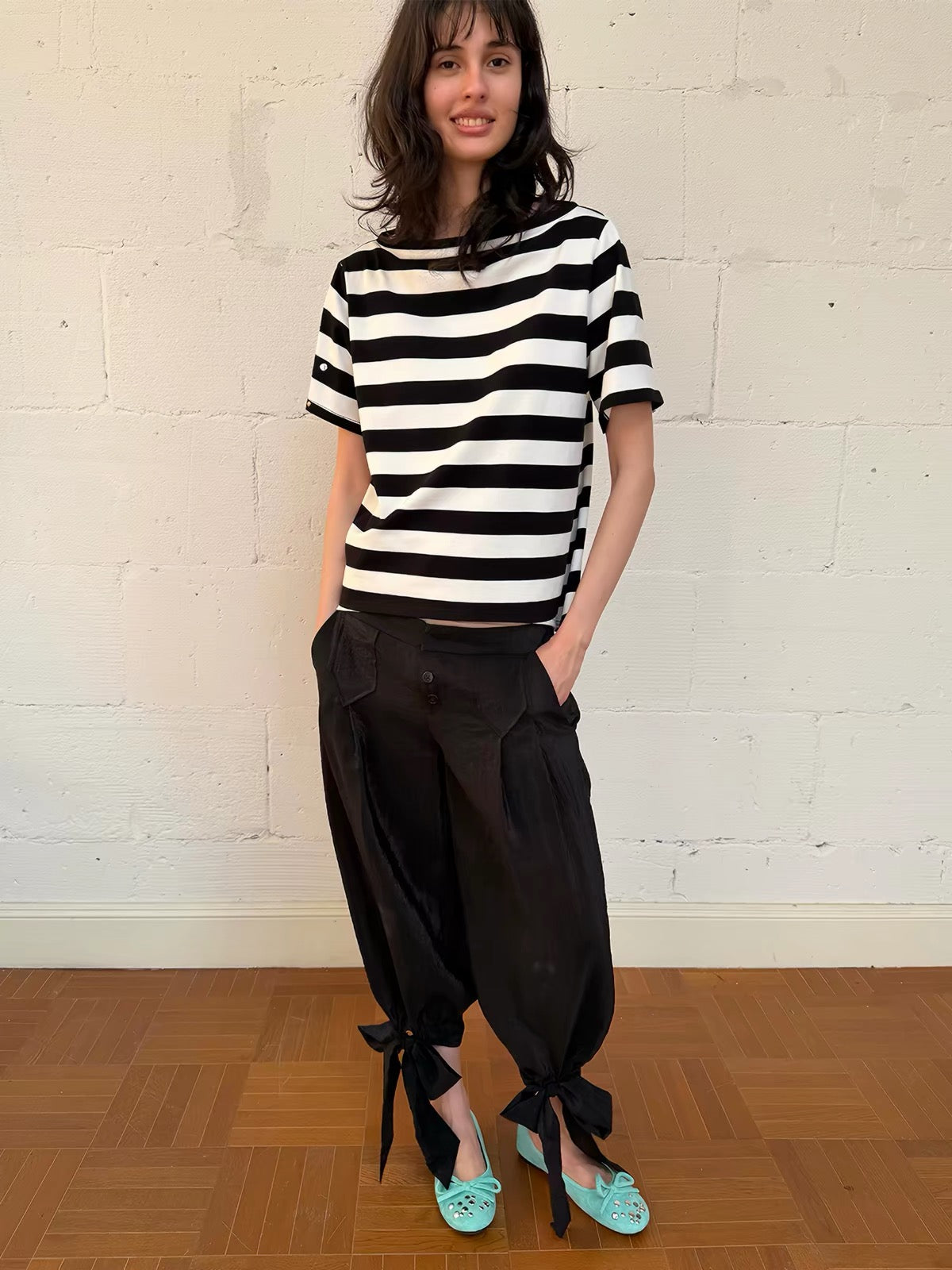 That’s neat Low-Rise Studded Tie Cuff Capri Trousers