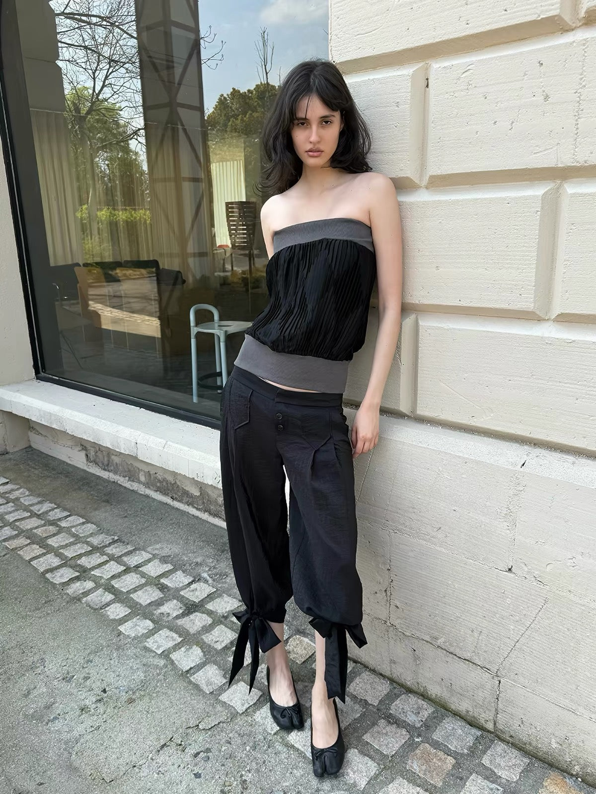 That’s neat Low-Rise Studded Tie Cuff Capri Trousers
