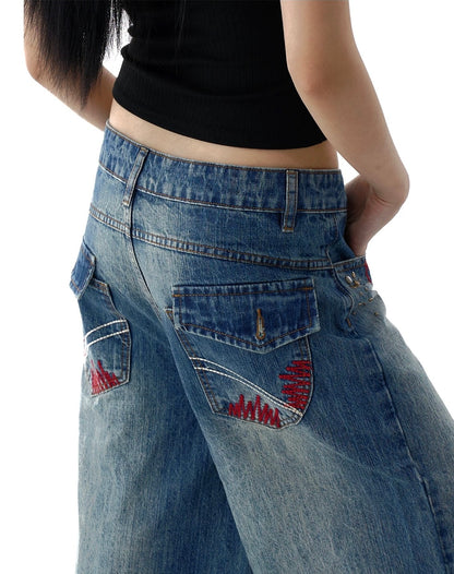 Dark Wash Embroidered Denim with Brass Rivets