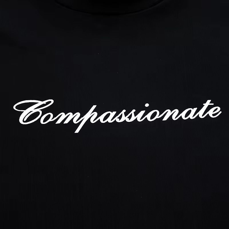 Compassionate Baby Tee In Black