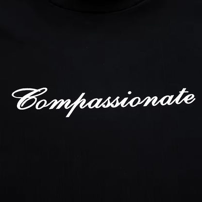 Compassionate Baby Tee In Black