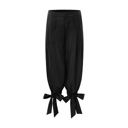 That’s neat Low-Rise Studded Tie Cuff Capri Trousers